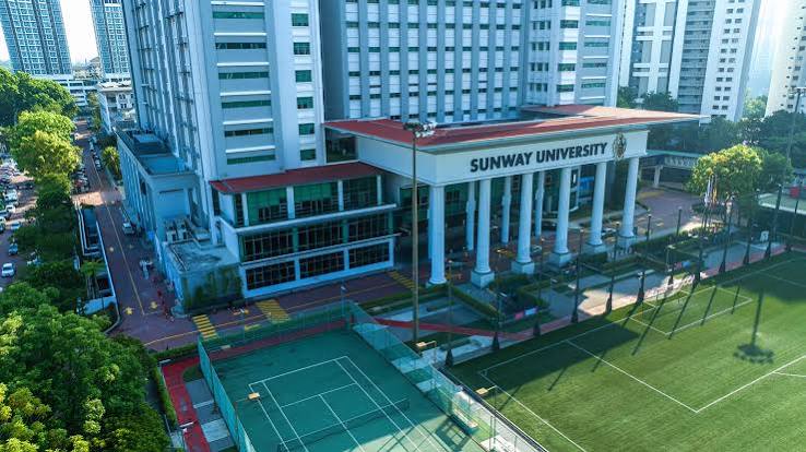 Modern campus lawn and building